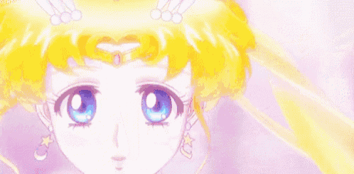 a close up of a girl in a sailor suit with blue eyes and a necklace .