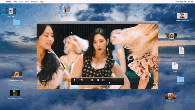 a computer screen shows a video of a group of women dancing