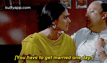 a man and a woman are sitting next to each other and the man is saying `` you have to get married one day . ''