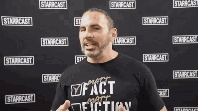 a man wearing a black shirt that says " matt fiction "