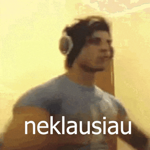 a man wearing headphones and a headband says neklausiu