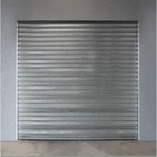 a metal roller shutter is closed on a building .