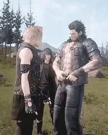 two men are standing in a field talking to each other .
