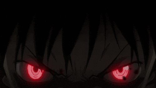 a close up of a person 's eyes with red lights