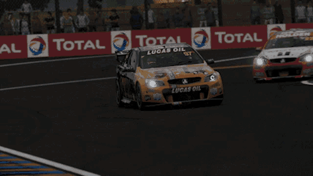 a dunlop sign hangs above a race track