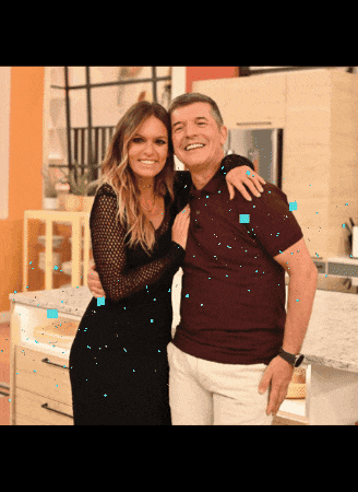 a man and a woman are posing for a picture together