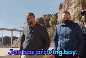a group of men standing next to each other with the words jan has arriving boy above them
