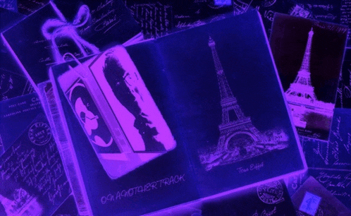a purple envelope with a picture of the eiffel tower and the words do a ghostwriter track on it