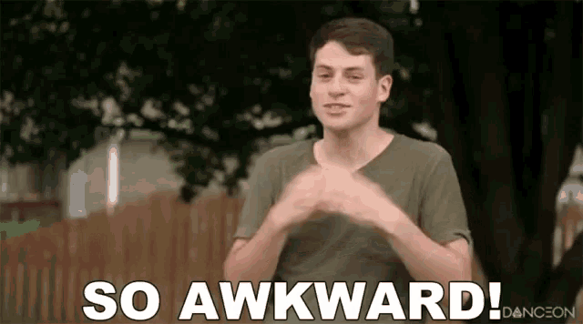 a young man is making a funny face and says `` so awkward '' .