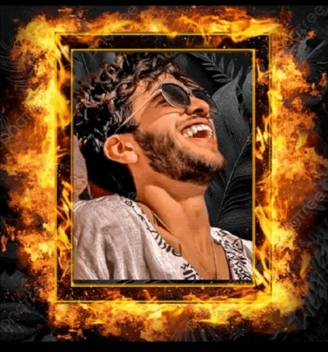 a picture of a man with a beard and sunglasses surrounded by flames
