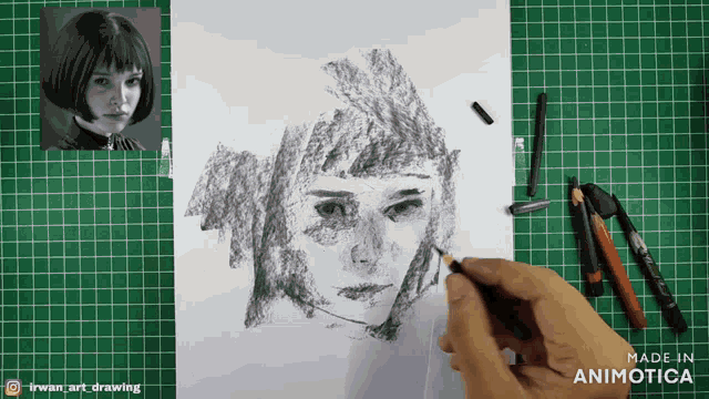 a drawing of a woman 's face is being made in animatica