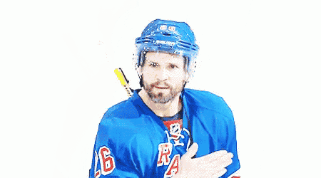 a hockey player wearing a blue jersey and a blue helmet with the number 9 on it