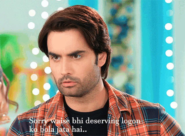 a man in a plaid shirt says sorry waise bi deserving logon