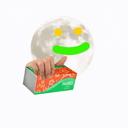 a person holding a package of paseo facial tissues