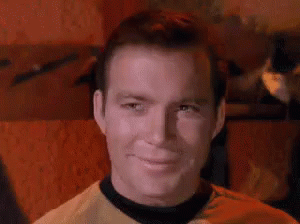 Kirk Chuckles - Star Trek: The Original Series GIF - Star Trek The Original Series Star Trek Captain Kirk GIFs
