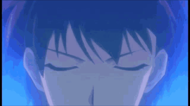 a close up of a person 's eyes with glowing blue eyes