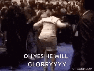 a woman is dancing in front of a crowd with the words `` oh , yes he will glory yy '' .
