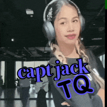 a woman wearing headphones has the caption capt jack tq