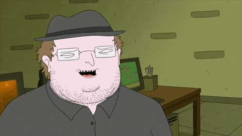 a cartoon man wearing glasses and a hat stands in front of a computer
