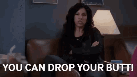a woman is sitting on a couch with the words `` you can drop your butt ! ''