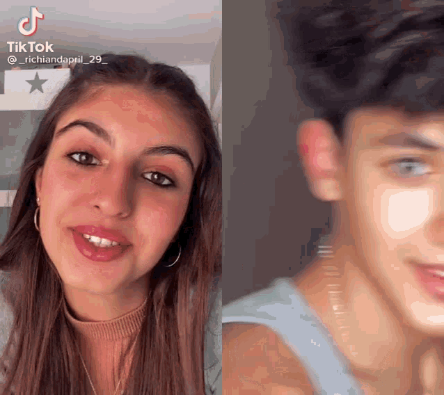 a girl and a boy are looking at each other and the girl is smiling .