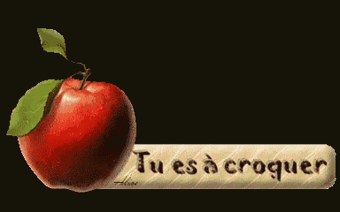 an apple with a heart cut out of it next to a sign that says ' tu es a croquer '