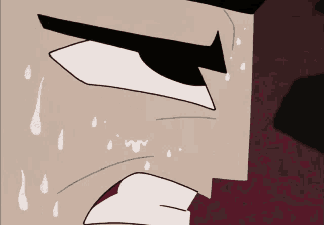 a close up of a cartoon character 's face with tears running down his face