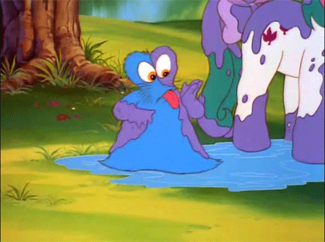 a blue and purple cartoon character standing in a puddle