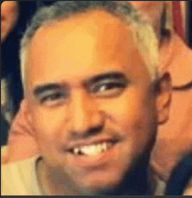 a close up of a man 's face with a smile on it