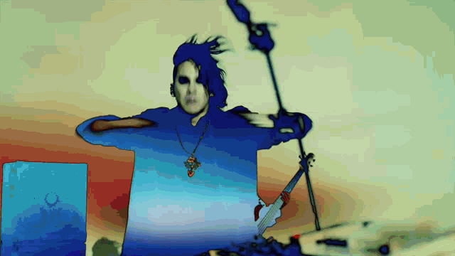 a man with blue hair is holding a guitar and a microphone