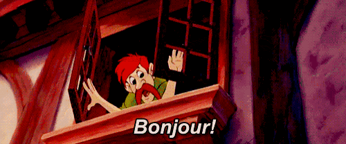 a cartoon character waving from a window with the words bonjour written below him
