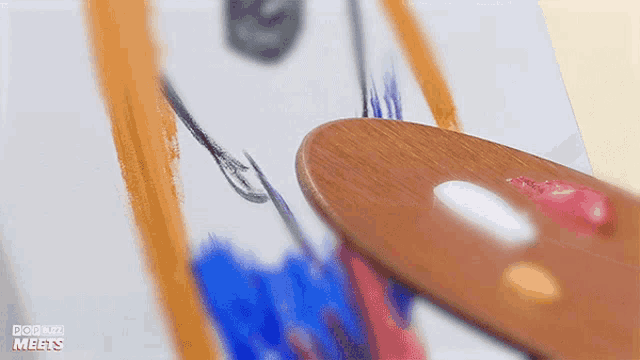 a wooden palette is being used to paint on a piece of paper that says power men 's on it