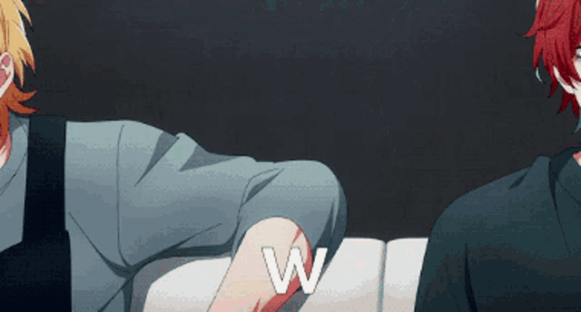 a couple of anime characters sitting next to each other with the letter w visible
