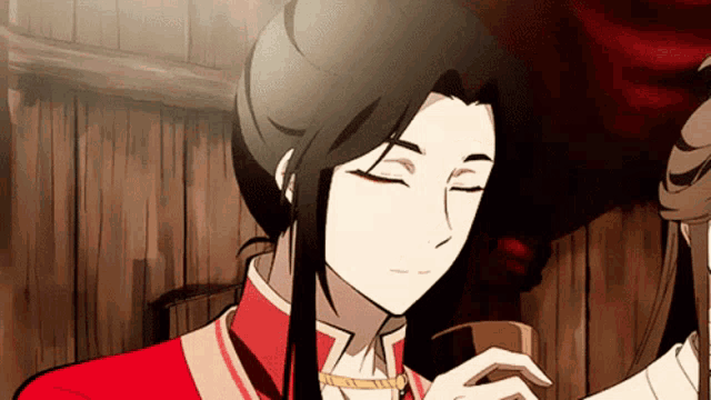 a cartoon character with long hair and a red shirt is smiling with his eyes closed