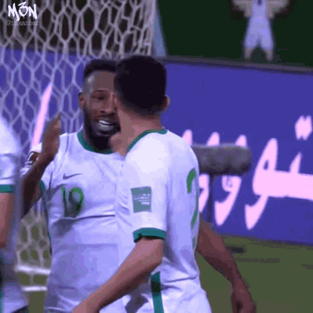 a soccer player with the number 19 on his shirt