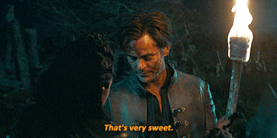 a man in a leather jacket is holding a torch and says that 's very sweet ..