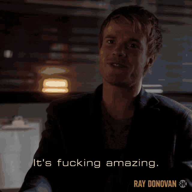 a man in a suit says it 's fucking amazing ray donovan