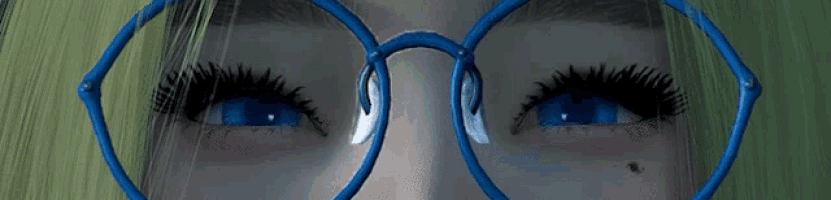 a close up of a woman 's eyes with blue glasses