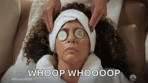 a woman with cucumber slices on her eyes is laying on a couch with the caption whoop whooop