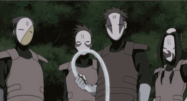a group of people with masks on their faces including one that has the letter s on it