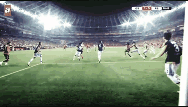 a soccer game is being shown on a television screen