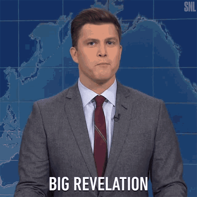a man in a suit and tie is saying " big revelation "