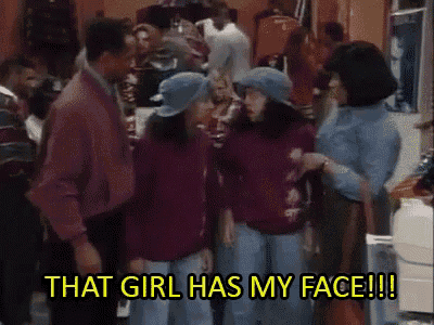 a group of people standing in a room with the words that girl has my face written on the bottom