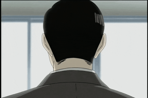 the back of a man 's head is shown with a surprised expression on his face
