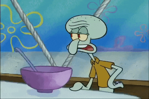 squidward from spongebob squarepants is kneeling down next to a bowl of cereal