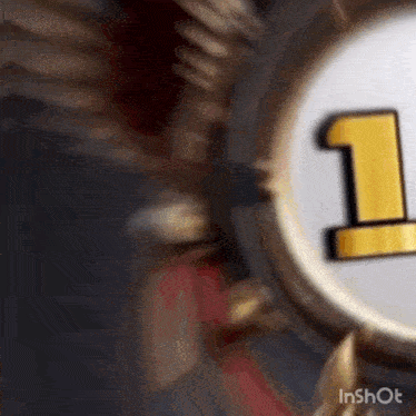 a close up of a medal with a number one on it .
