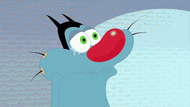 a cartoon character has a red nose and green eyes