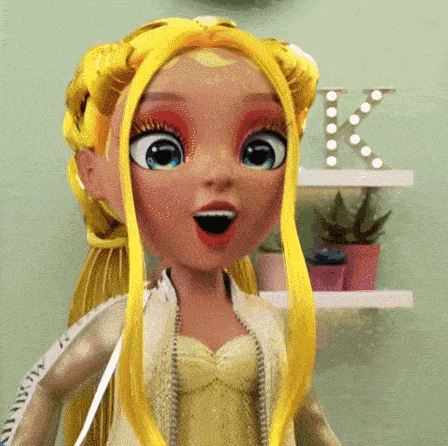 a doll with a surprised look on her face is standing in front of a shelf with a letter k on it