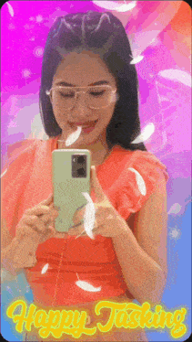 a woman is taking a picture of herself in a mirror with the words happy tasking behind her
