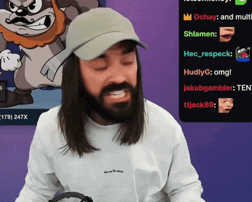 a man with long hair and a beard is wearing a white acne studios shirt